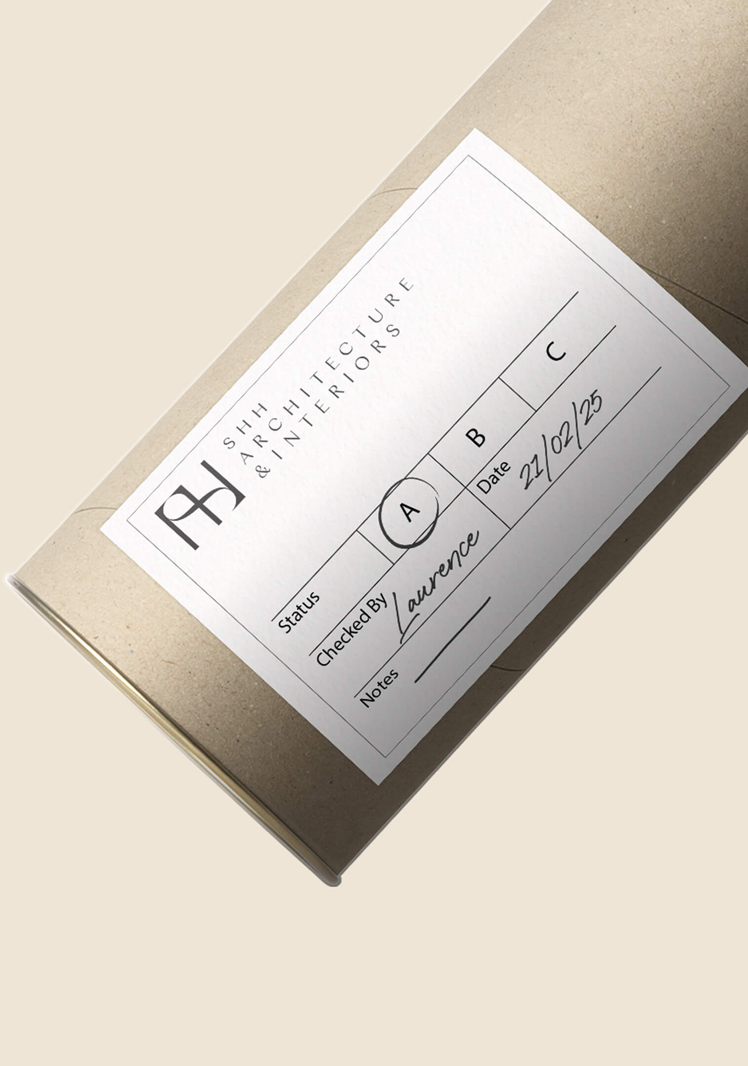 Architectural drawing tube labeled with SHH Architecture & Interiors branding