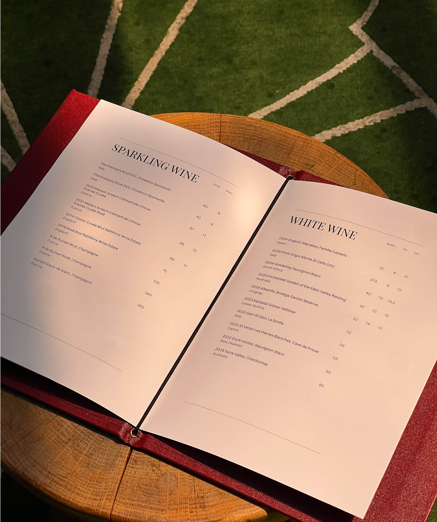 Open wine list displaying refined typography and layout for The Arding Rooms