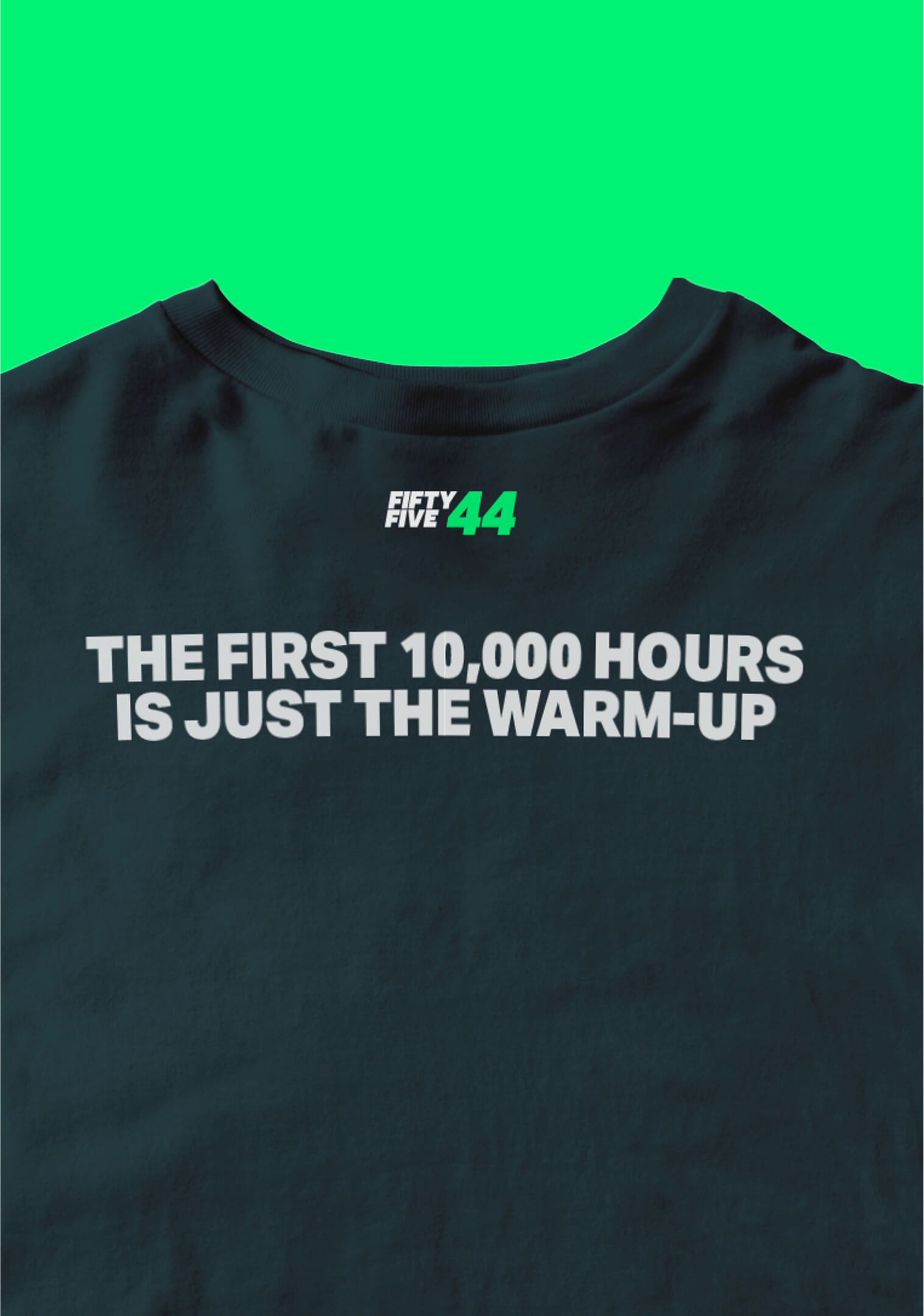 T-shirt mockup with FiftyFive44 logo and motivational quote ‘The first 10,000 hours is just the warm-up'